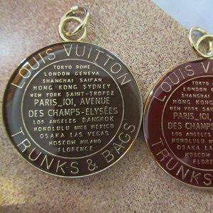 LOUIS VUITTON 2 CHARMS, TRUNKS AND BAGS 1 1/4 INCH BROWN, MAROON, GOLD TONE